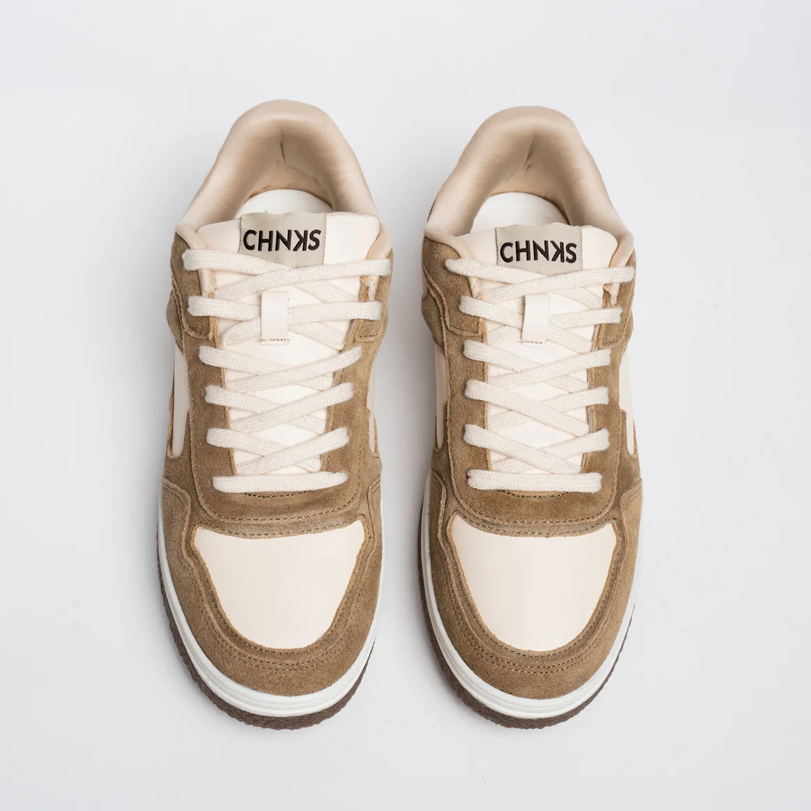 Top view of Dunescape CHNKS beige sneakers – minimalist men’s sneakers with smooth texture