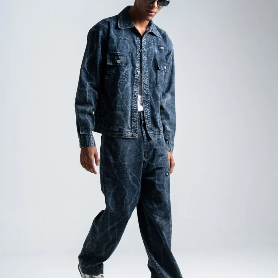 Model wearing Cove CHNKS sneakers with denim outfit – blue and beige men’s sneakers styled for casual streetwear