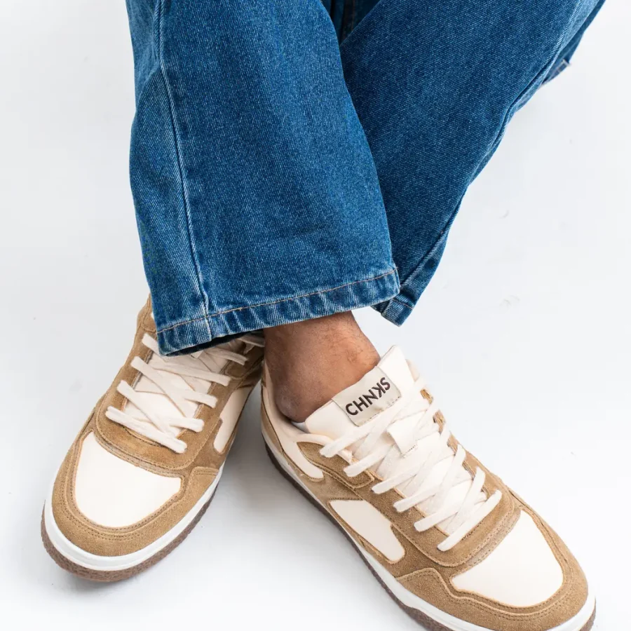 Dunescape CHNKS sneakers on men’s feet side angle – tan beige sneakers for daily comfort