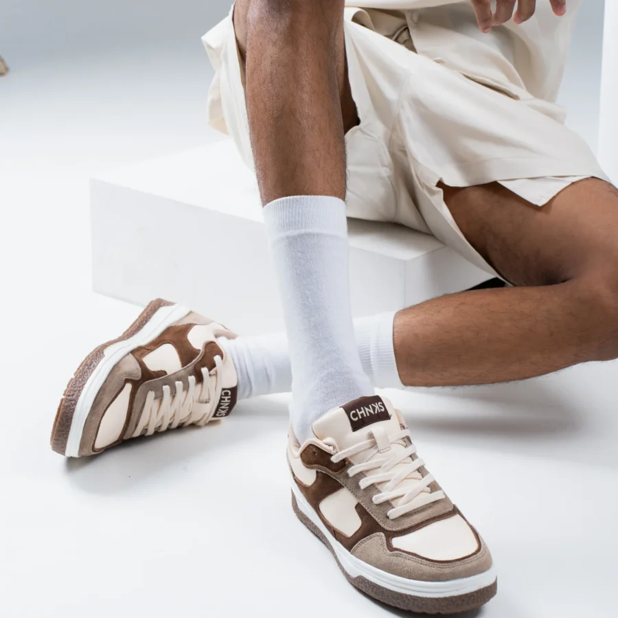Affogato CHNKS brown sneakers lifestyle image – paired with off-white shorts for casual style
