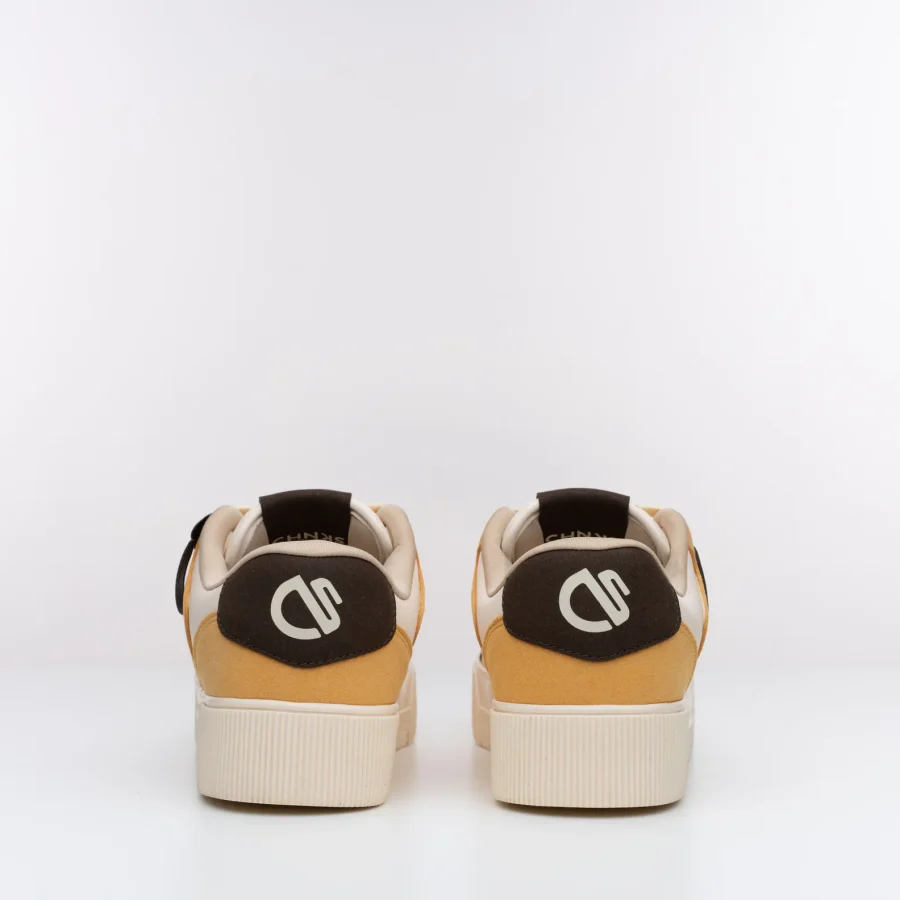 Rear view of Butterscotch CHNKS yellow sneakeBack view of Buttercotch CHNKS sneakers with CHNKS logo – yellow sneakers for everyday wearrs