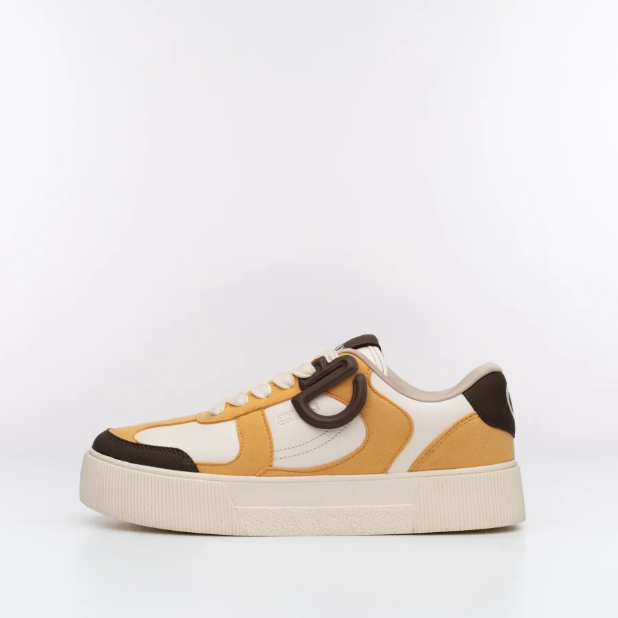 Side view of Buttercotch CHNKS sneakers – bright yellow sneakers with minimal design for men and women