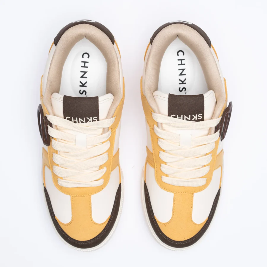 Top view of Buttercotch CHNKS sneakers – premium yellow upper with breathable design