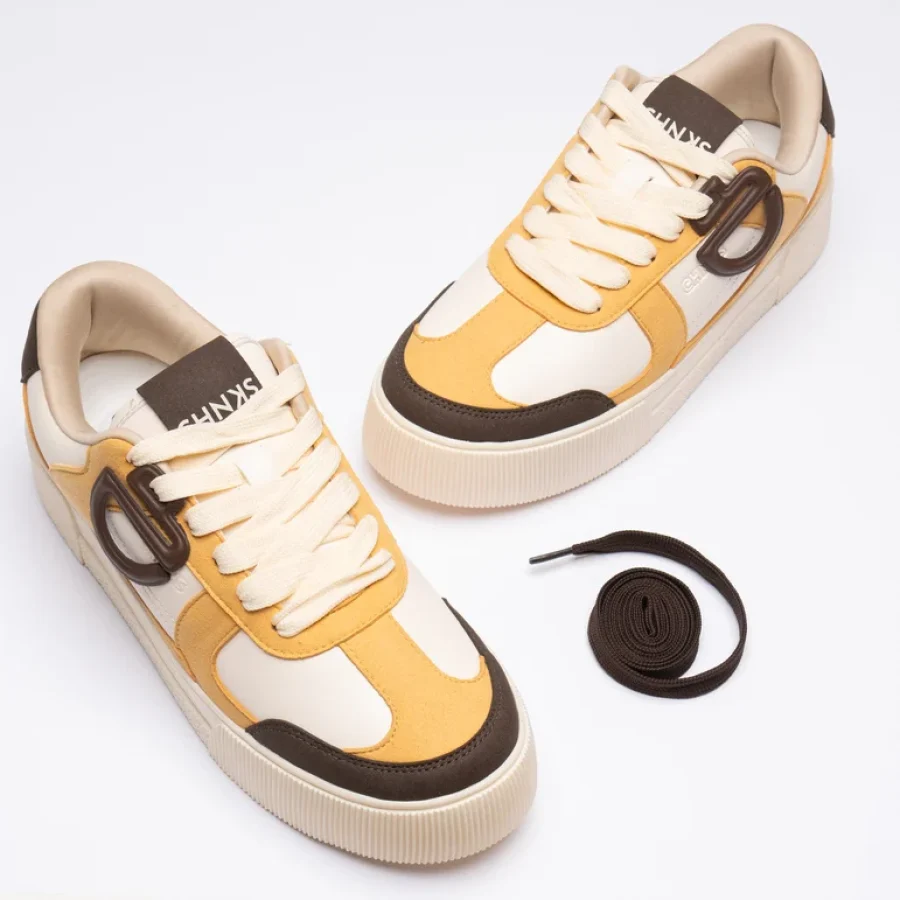Front view of Buttercotch CHNKS sneakers – yellow sneakers with modern toe design
