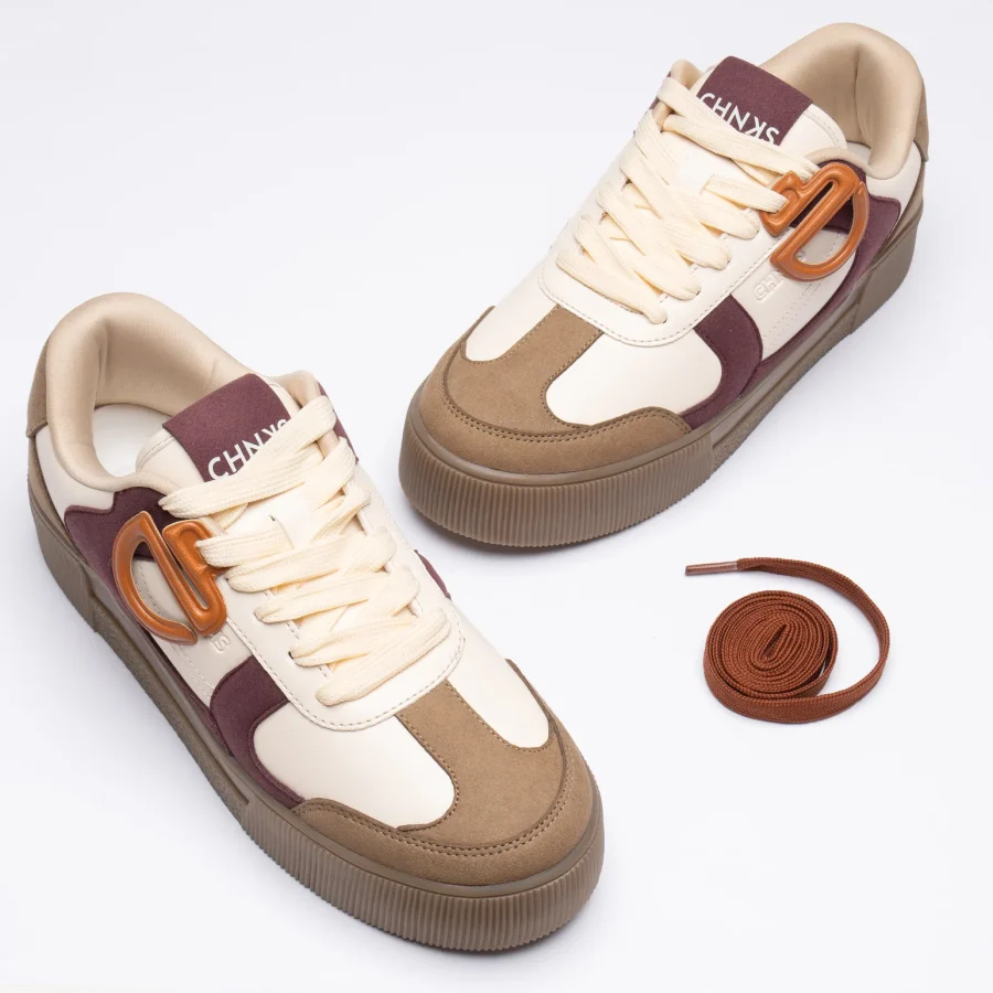 Front view of CHNKS Cranberry sneakers - maroon red sneakers for men and women featuring sleek toe design and lace-up closure