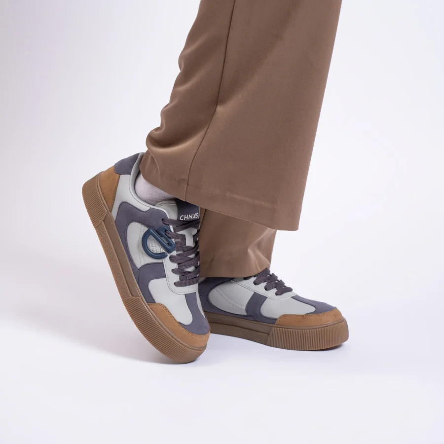 Granite CHNKS sneakers styled with brown trouser shorts – relaxed unisex casual look